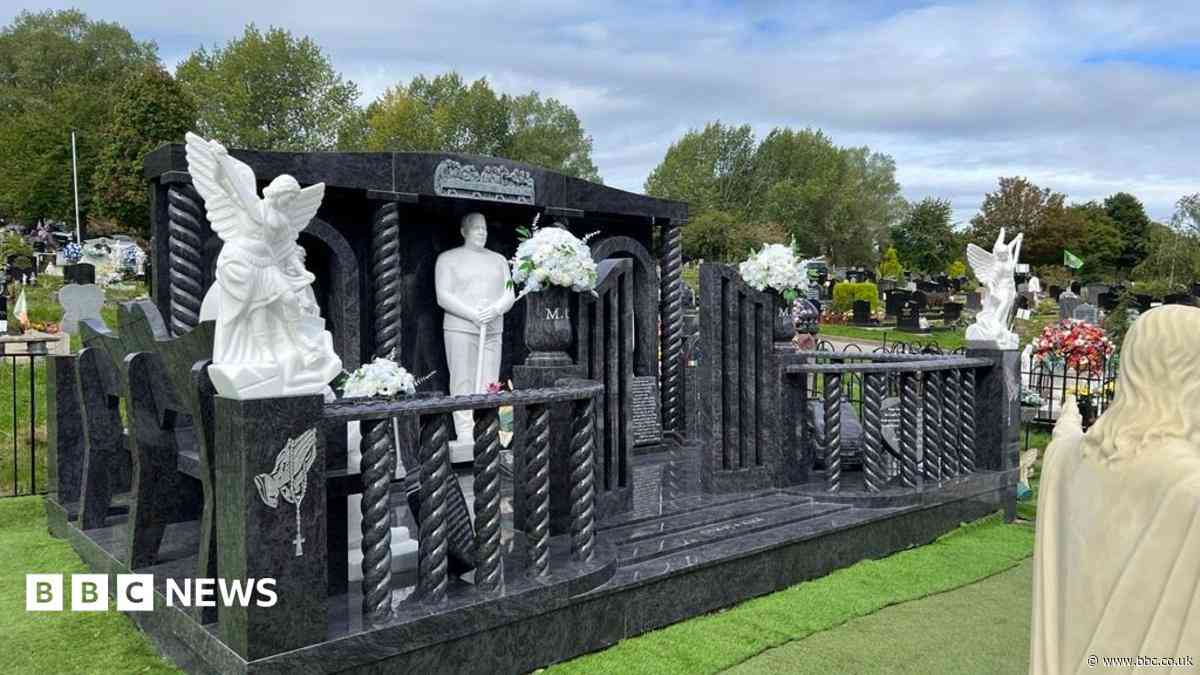 Huge memorial to dad, 51, erected in cemetery