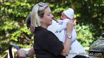 Kelsey Parker is seen for the first time with her newborn daughter River as she enjoys a family stroll with partner Will Lindsay - a year after losing their son Phoenix