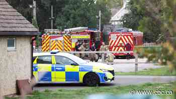 U.K. police evacuate homes near U.S. air base and detain men on suspected explosives offensives