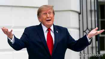 Trump boasts about economy, slams 'fake news' amid media battle