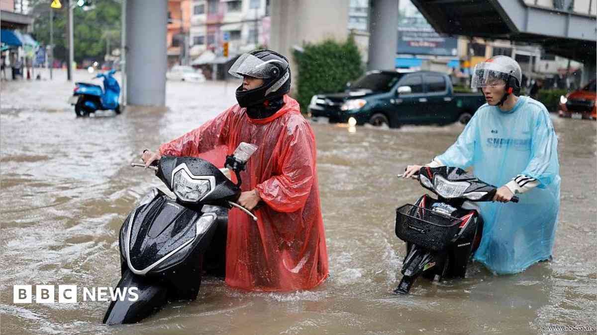 Bangkok roads submerged as flood disaster declared