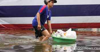 Rain eases in Bangkok but persistent flooding forces thousands to leave home
