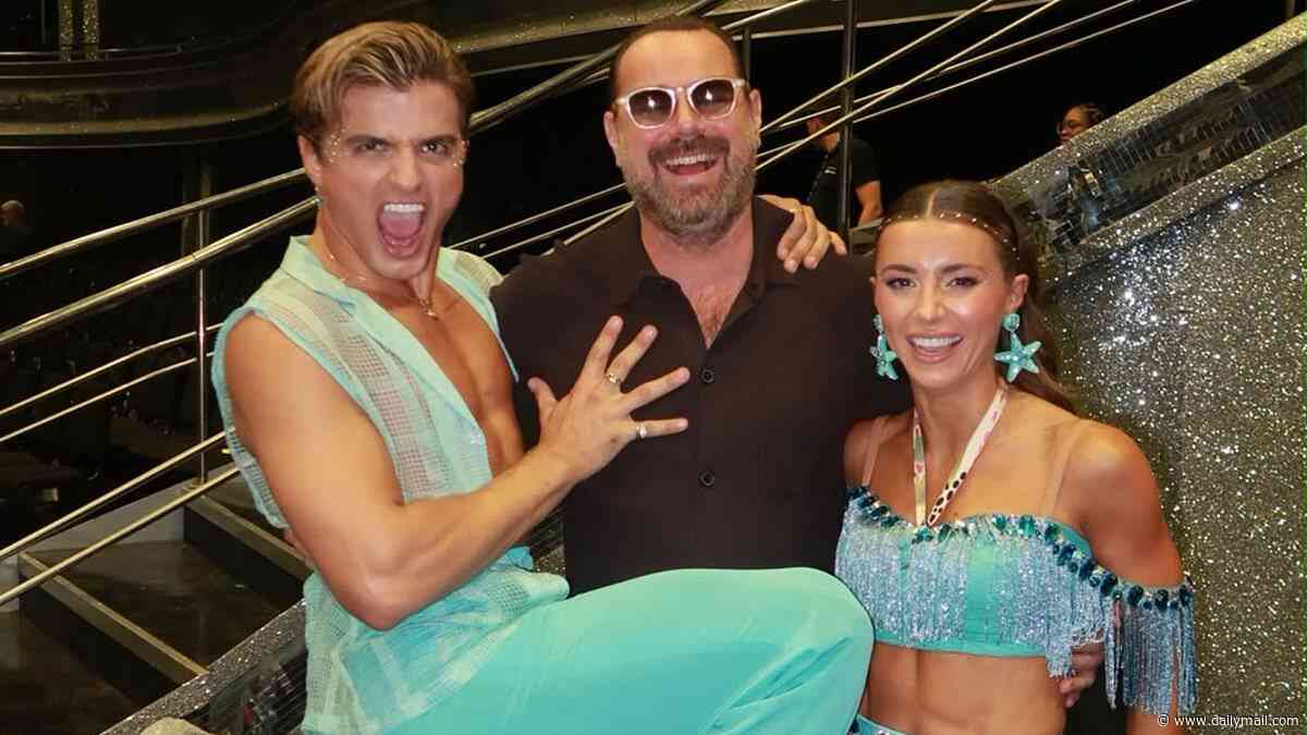 Dani Dyer is supported by her dad Danny at the first Strictly live show as he poses in hilarious snap with her pro partner Nikita Kuzmin