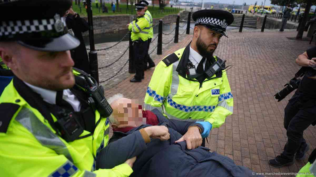 Police arrest two, including elderly man sitting under tree, outside Labour conference