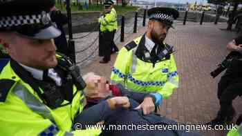 Police arrest two, including elderly man sitting under tree, outside Labour conference