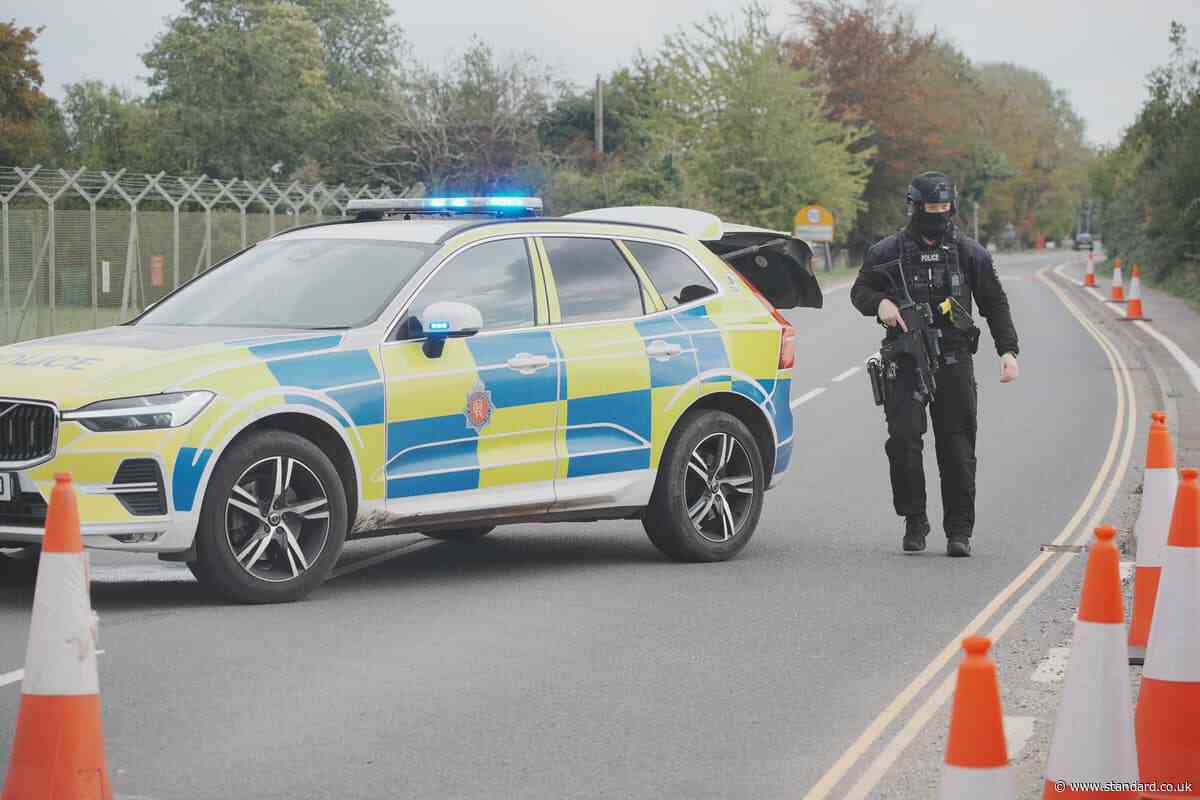 Five held under anti-terror laws after three vans stopped near RAF base
