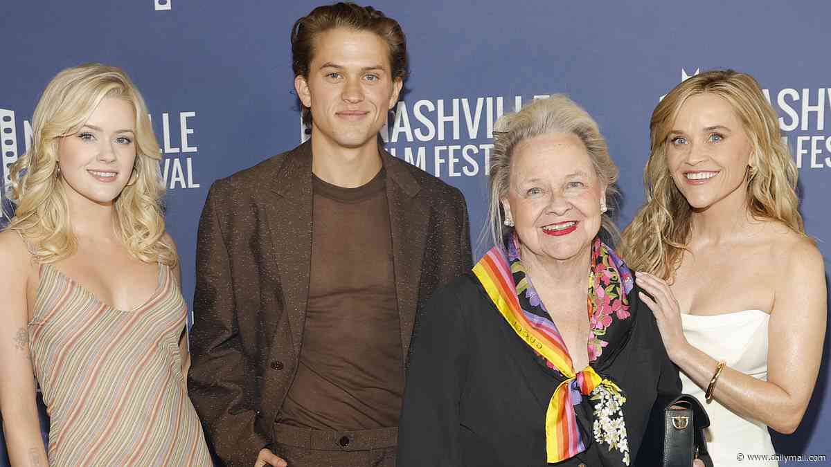 Youthful-looking Reese Witherspoon poses with her mini-me daughter, son and mom at premiere in Nashville