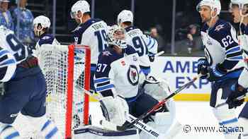 'We still have a lot of good pieces,' says Jets captain Lowry as training camp continues without Hellebuyck