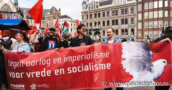 Duizenden mensen op de Dam bij protestactie ‘Stop de Oorlogskoorts’