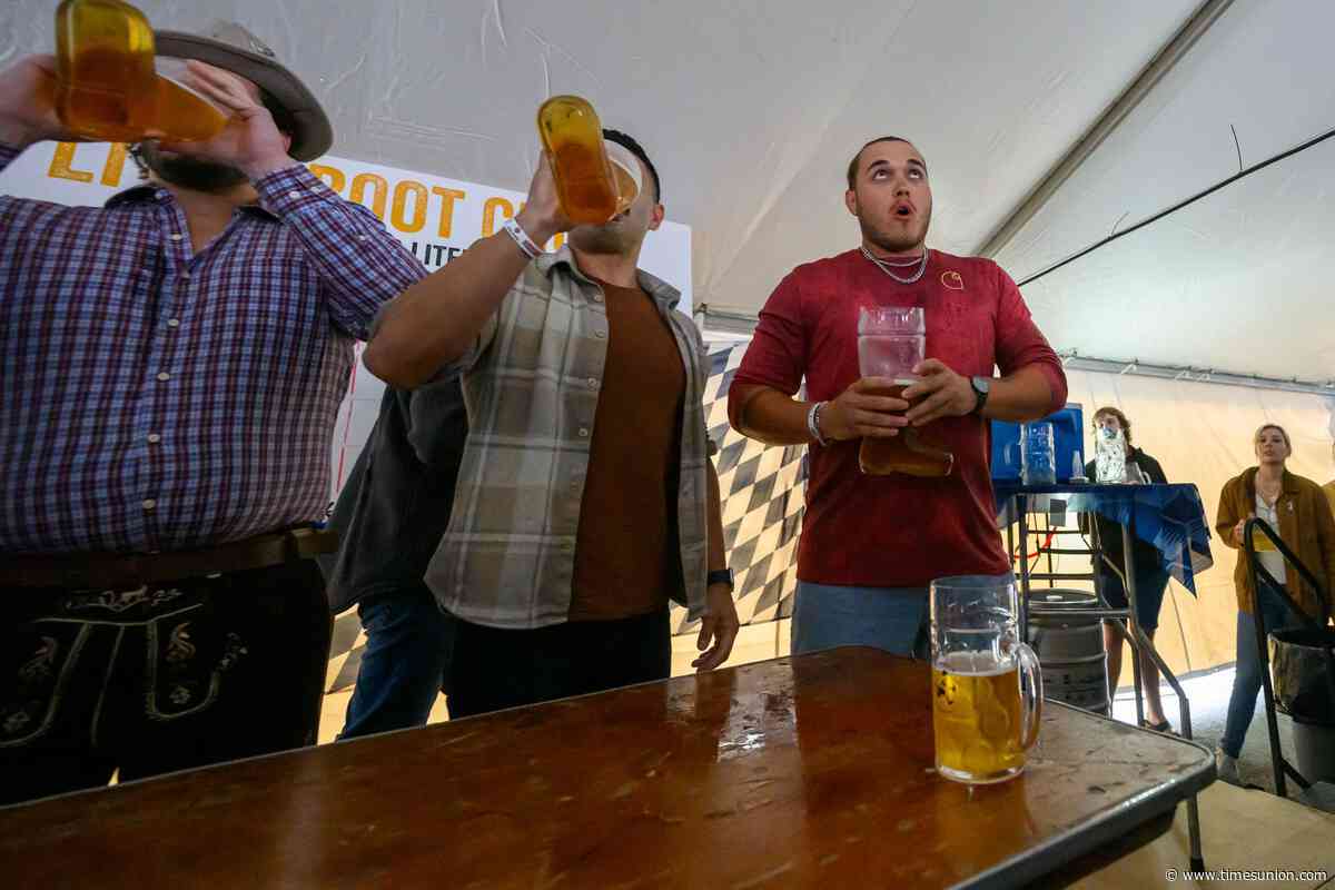 Photos: Rainy day doesn't keep beer lovers away from Wolff’s Biergarten Oktoberfest