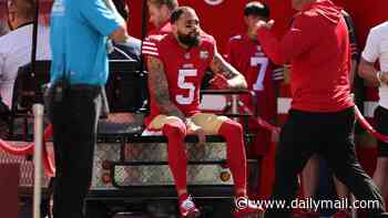 San Francisco 49ers injury curse gets even worse as Mike Evans is carted off while struggling to BREATHE