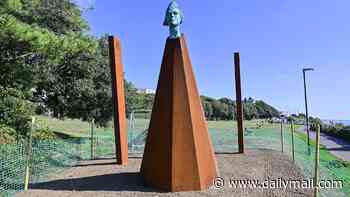 Town's 'eyesore' new sculpture which cost £54,000 to build is branded 'some rusted metal with a head on top' by locals