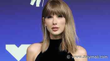 Taylor Swift shows off VERY tiny waist in sexy black gown with silver skirt as she hits 2026 MTV VMAs red carpet without Travis Kelce... ahead of her big award
