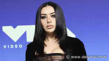 Charli XCX suffers awkward wardrobe malfunction on VMAs 2026 red carpet