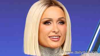 Paris Hilton goes intergalactic glam for the 2026 MTV VMAs in sparkly silver look as she brings sister Nicky as her red carpet date