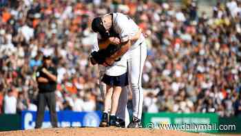 Flirty Justin Verlander play that captured Kate Upton's heart resurfaces as he is helped off pitcher's mound by their daughter in emotional retirement 22 years later