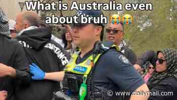 Cops intervene as masked men rally in support of 'looksmaxxer' Clavicular in Melbourne after he was charged with rape