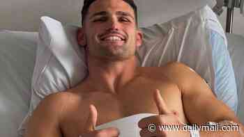 Nathan Cleary gives two thumbs up from his hospital bed after 'worst leg break ever seen' triggered grave fears about his left foot