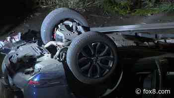 SUV falls off bridge, lands in parking lot below, killing 1 and injuring 3