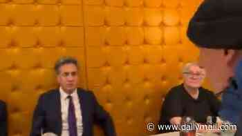 Ed Miliband confronted by Palestine Action activists in Pizza Express as more than 100 activists are arrested at conference demo