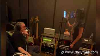 Victoria Beckham teases collaboration with her son Cruz as she gets behind the mic during recording studio session
