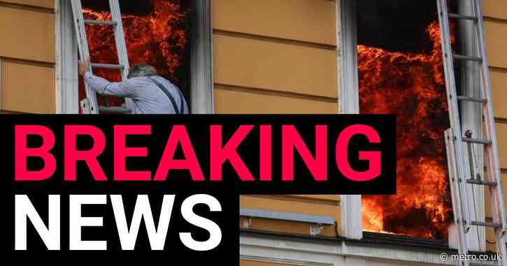 People flee for their lives from flaming building after it’s hit by jet-powered drone in Kyiv