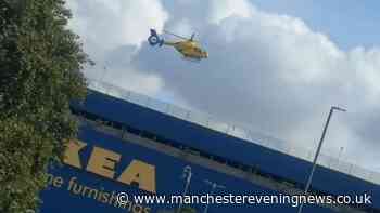 Armed police at Ashton IKEA as air ambulance lands on car park roof in major response
