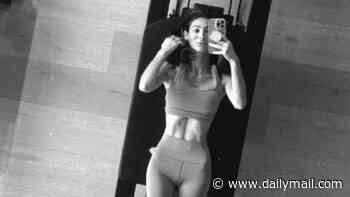 Luisa Zissman poses in a crop top as she works up a sweat at reformer Pilates after 'skinny shaming' row