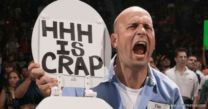 WWE’s Iconic Sign Guy Rick Achberger Dies
