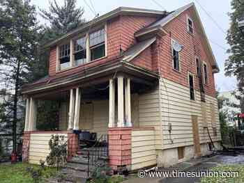 Troy couple killed in house fire, daughter gravely injured