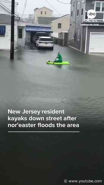 New Jersey resident kayaks down street after nor'easter floods the area