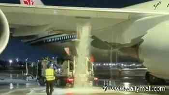 Moment airport worker causes huge leak after driving off with fuel hose still attached to jumbo jet