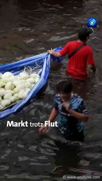 Bangkok: Bewohner richten Markt trotz Flut aus