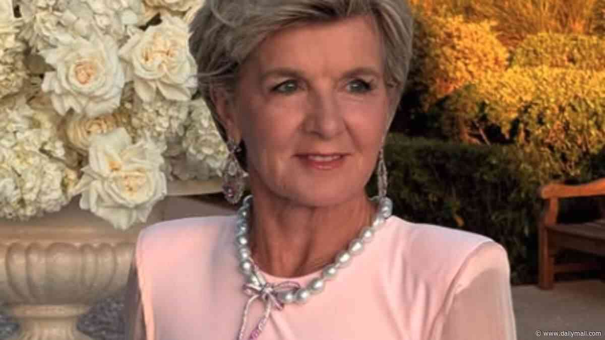 Julie Bishop serves major glamour decked out in thousands of dollars worth of jewels and a figure-hugging pink gown alongside beau Stephen Gray in Cannes