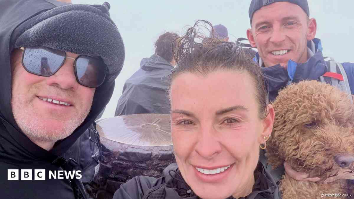 Wayne and Coleen Rooney climb Wales' highest mountain