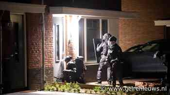 Vrouw aangehouden tijdens inval in woning