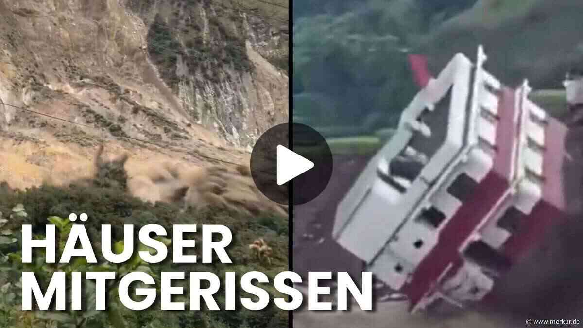 Erschreckende Szenen: Erdrutsch stürzt ins Tal ab und Hochwasser reißt Haus mit