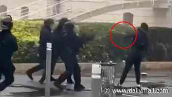 Moment French riot cop shoots teenage protester in the face with a grenade launcher from a metre away 'tearing his mouth apart'