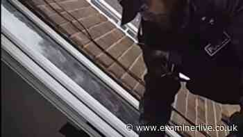 Moment police smash down door in raids on drug gang with £420k stash