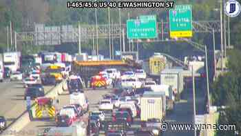 Overturned school bus closes I-465 on east side; 3 children injured