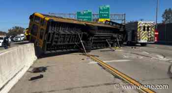 School bus overturns on 465; multiple children, adults hurt