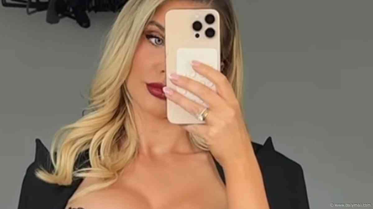 Helen Flanagan models a corset in sexy new Instagram pictures before revealing she's removing the tiger tattoo which replaced her engagement ring from Scott Sinclair