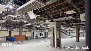 Abandoned store to become shopping arcade and flats
