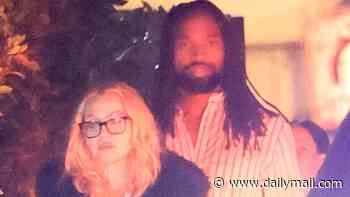 Forlorn Madonna, 68, breaks cover with toyboy Akeem Morris, 30, in first sighting since VMAs disaster led to family intervention