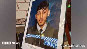 Condolence book given to family of PC killed by car