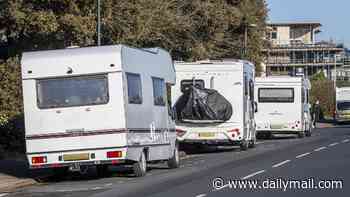 Van-dwellers accused of turning seaside town into 'unregulated campsite' by parking up for months at a time outside homes of furious locals