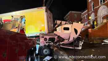 Driver rescued after tractor-trailer crashes into stone wall in Derby