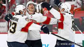 Canes lift banner, Panthers win 'playoff-style' opener in OT
