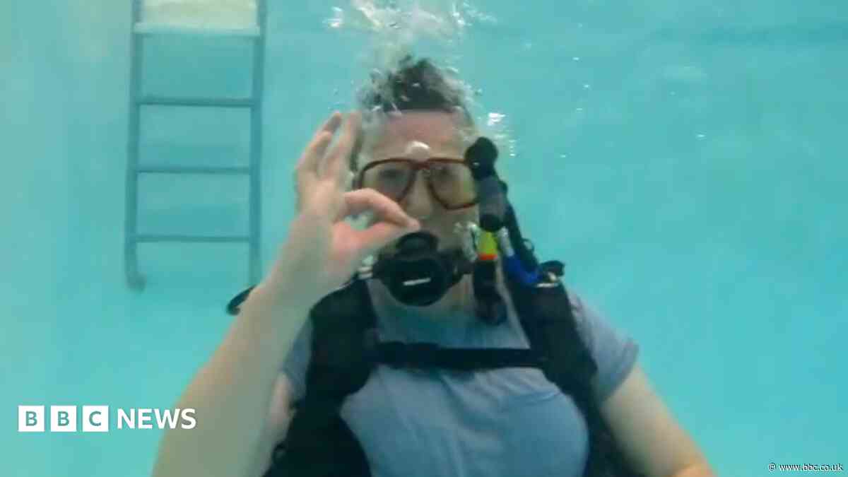 I'm swimming with sharks to get through cancer diagnosis