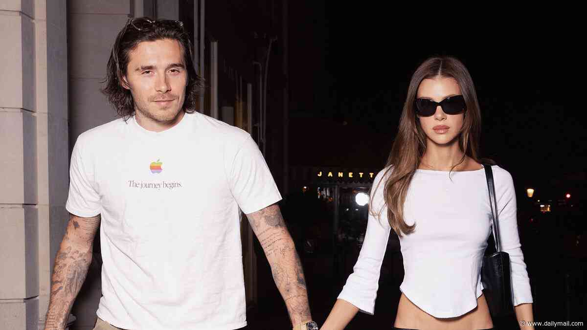 Brooklyn Beckham and Nicola Peltz walk hand in hand as they arrive in the French capital for Paris Fashion Week - just days before estranged mum Victoria's show